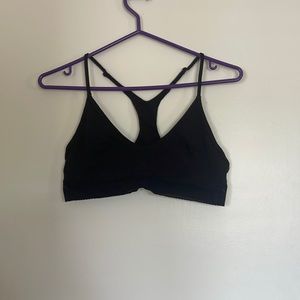 Lululemon lounge bra with lululemon written on the mesh bottom. Size L black
